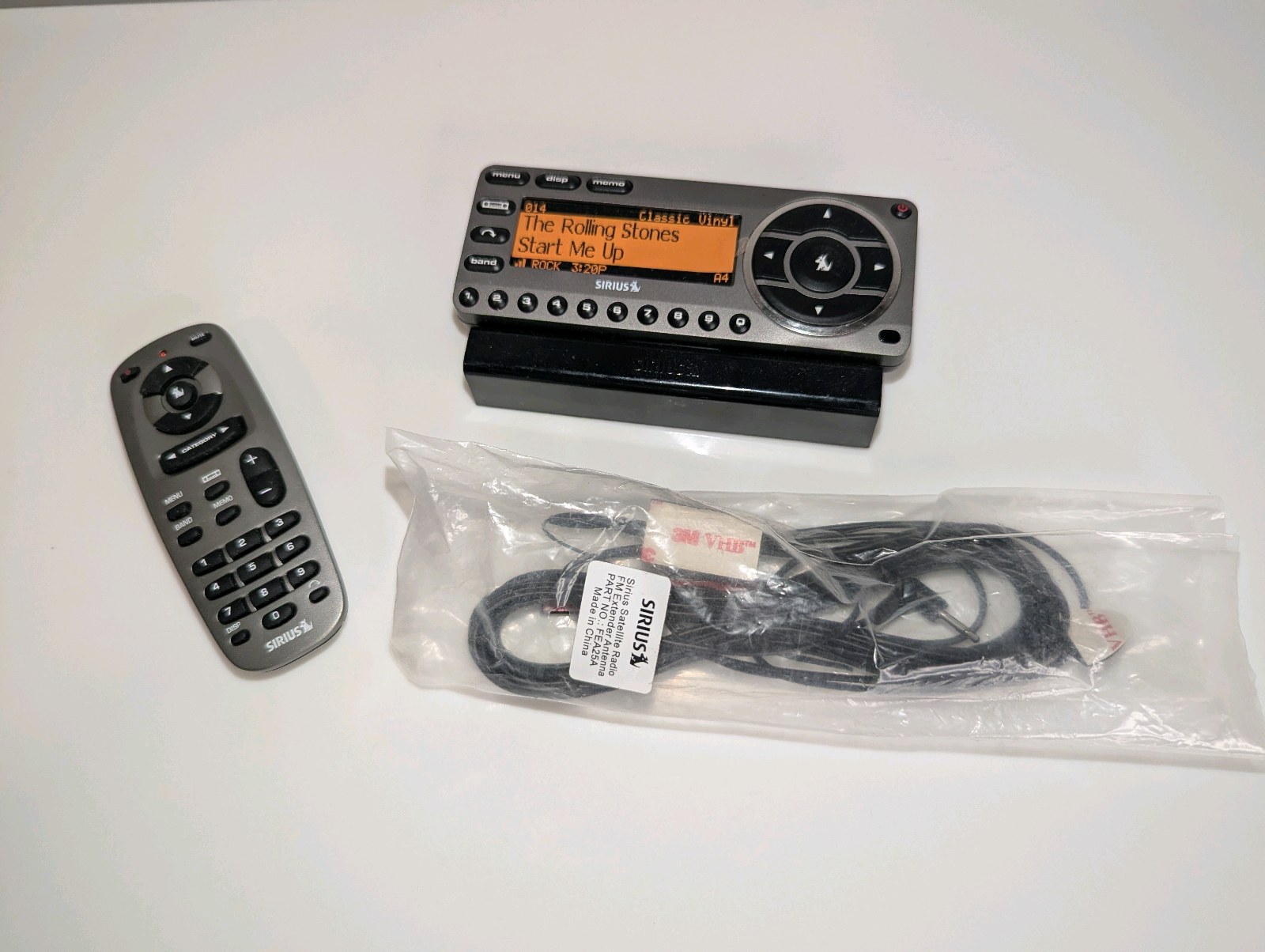 SiriusXM Starmate satellite radio receiver with a vehicle kit