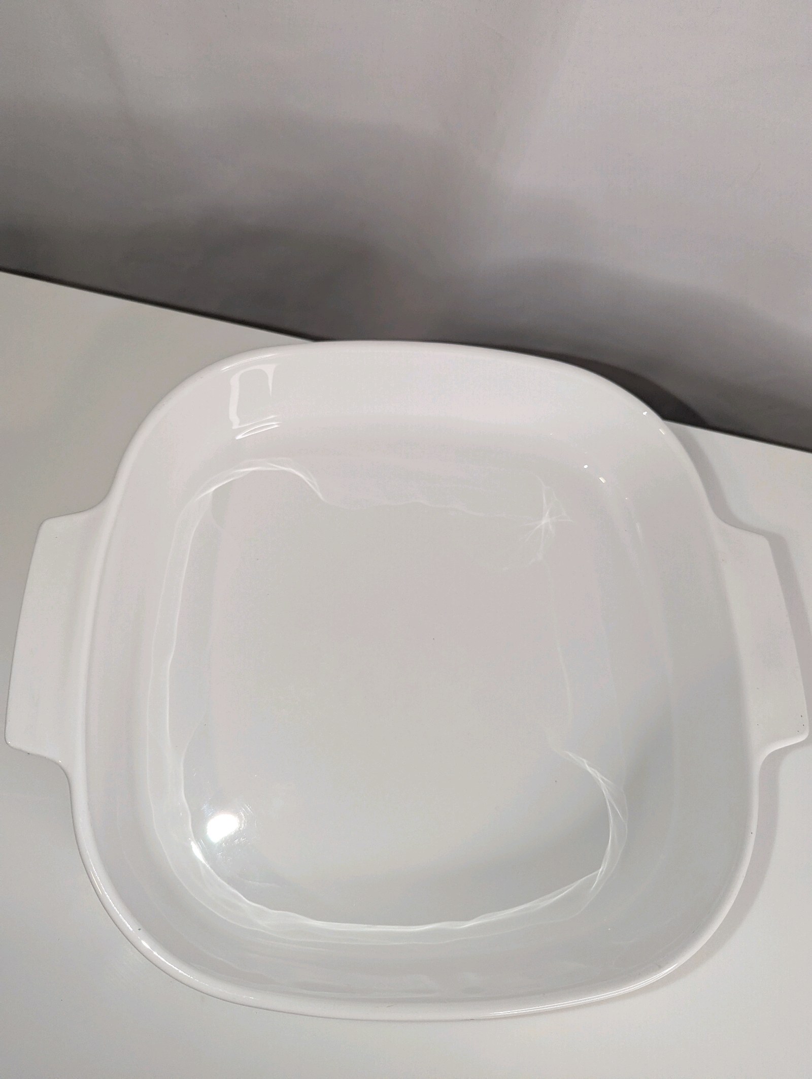 Vintage Corning Ware casserole dish in the "Evening Song" pattern, no lid