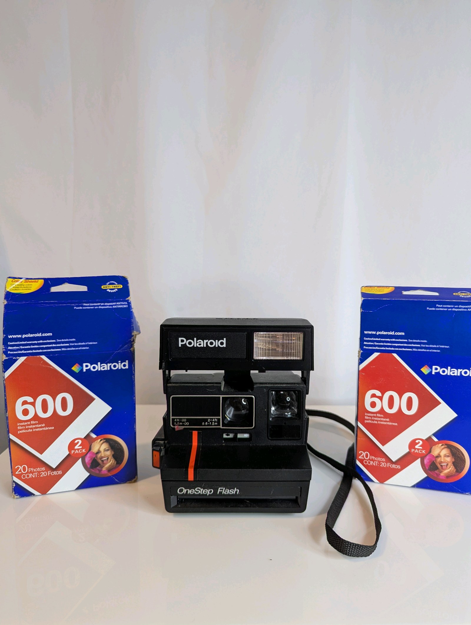 Vintage Polaroid OneStep Flash instant camera, with 2 packs film